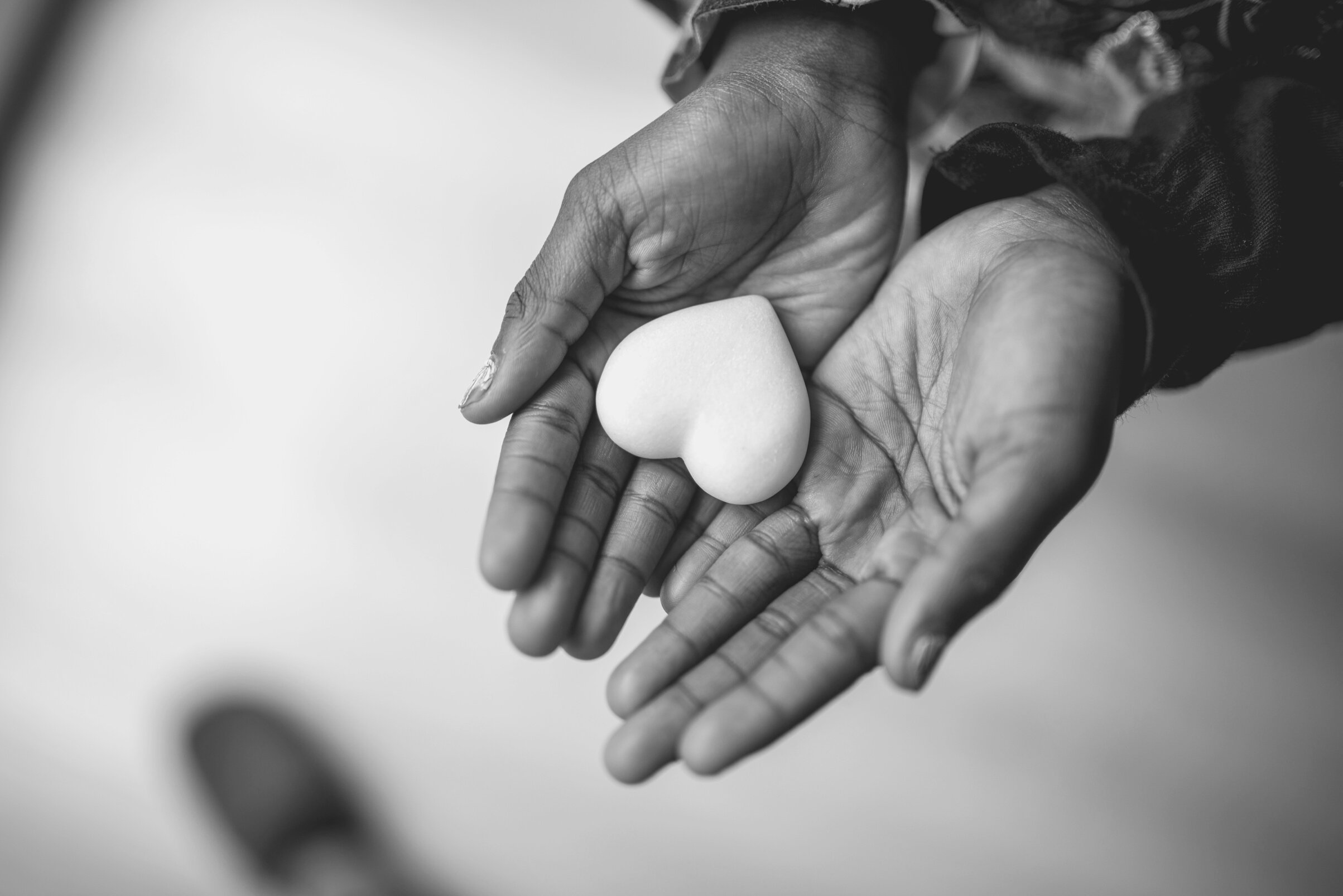 African-American Girl Hands Holding a Marble 